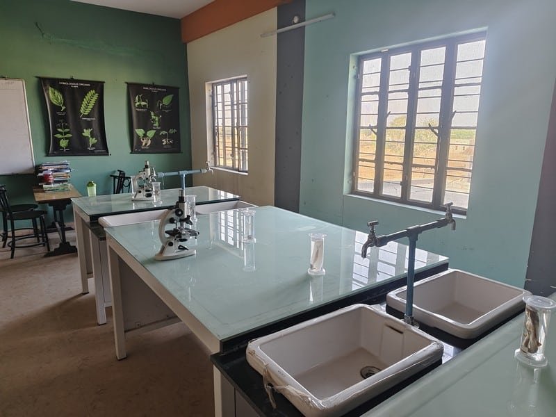 Biology laboratory microscope slides and specimens at Dunes Academy Rajasthan