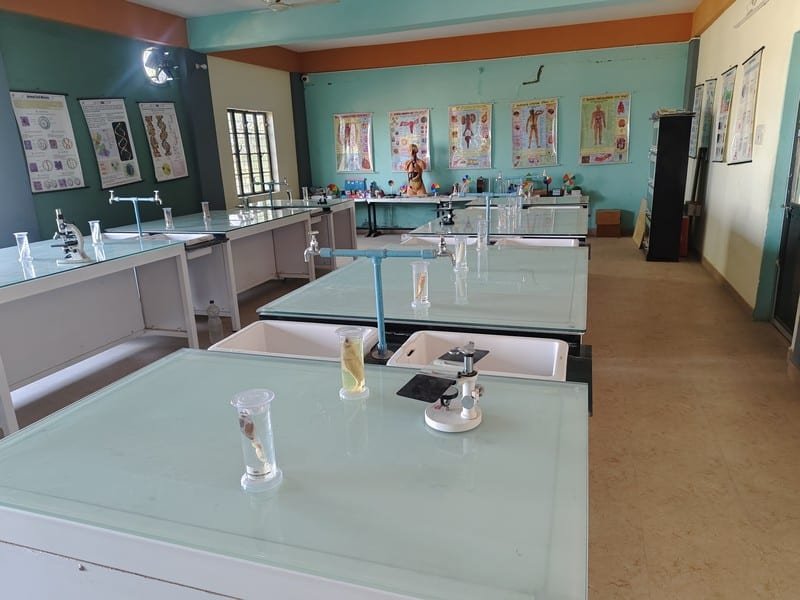 Biology laboratory microscopes and specimens at Dunes Academy