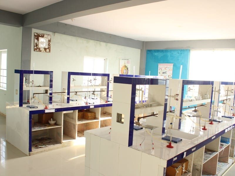 Chemistry laboratory titration and reagent work at Dunes Academy