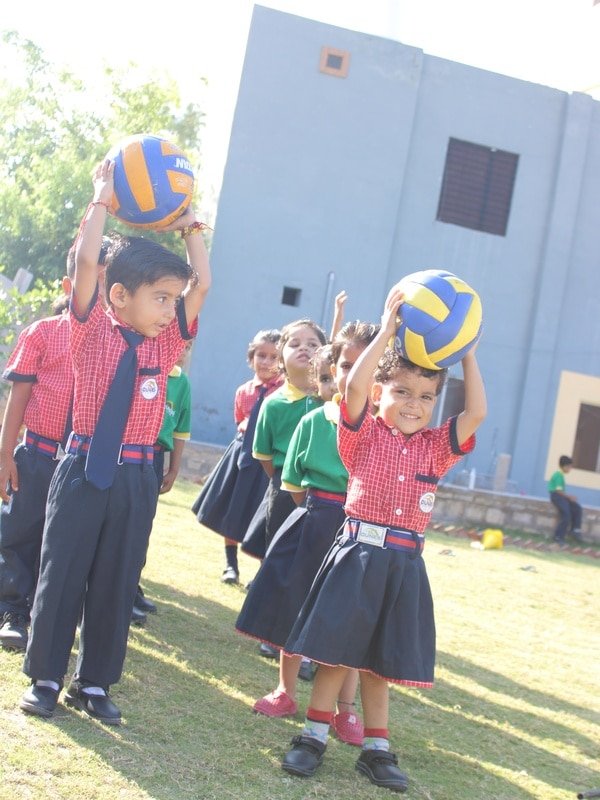 Supervised outdoor play time for pre-primary children at Dunes Academy