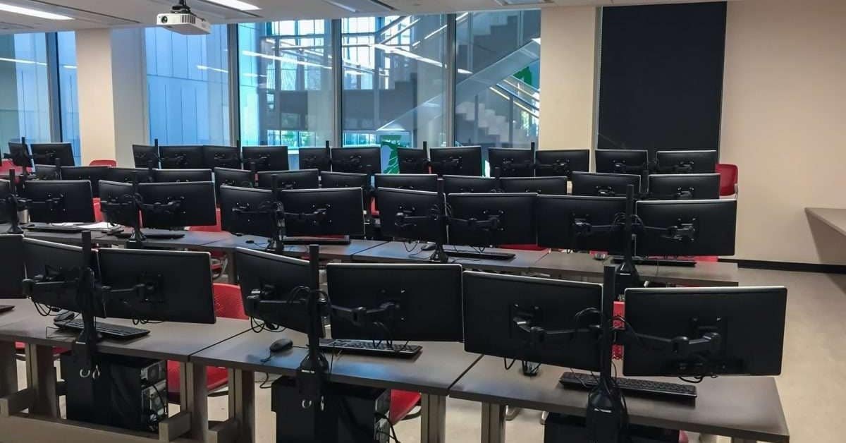 Students working on computers in the computer laboratory at Dunes Academy