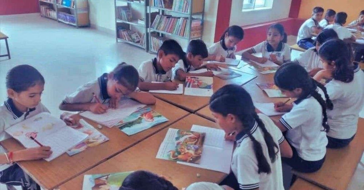 Students reading in school library at Dunes Academy