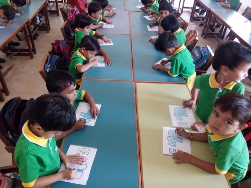 Young students during a nursery activity at Dunes Academy age criteria